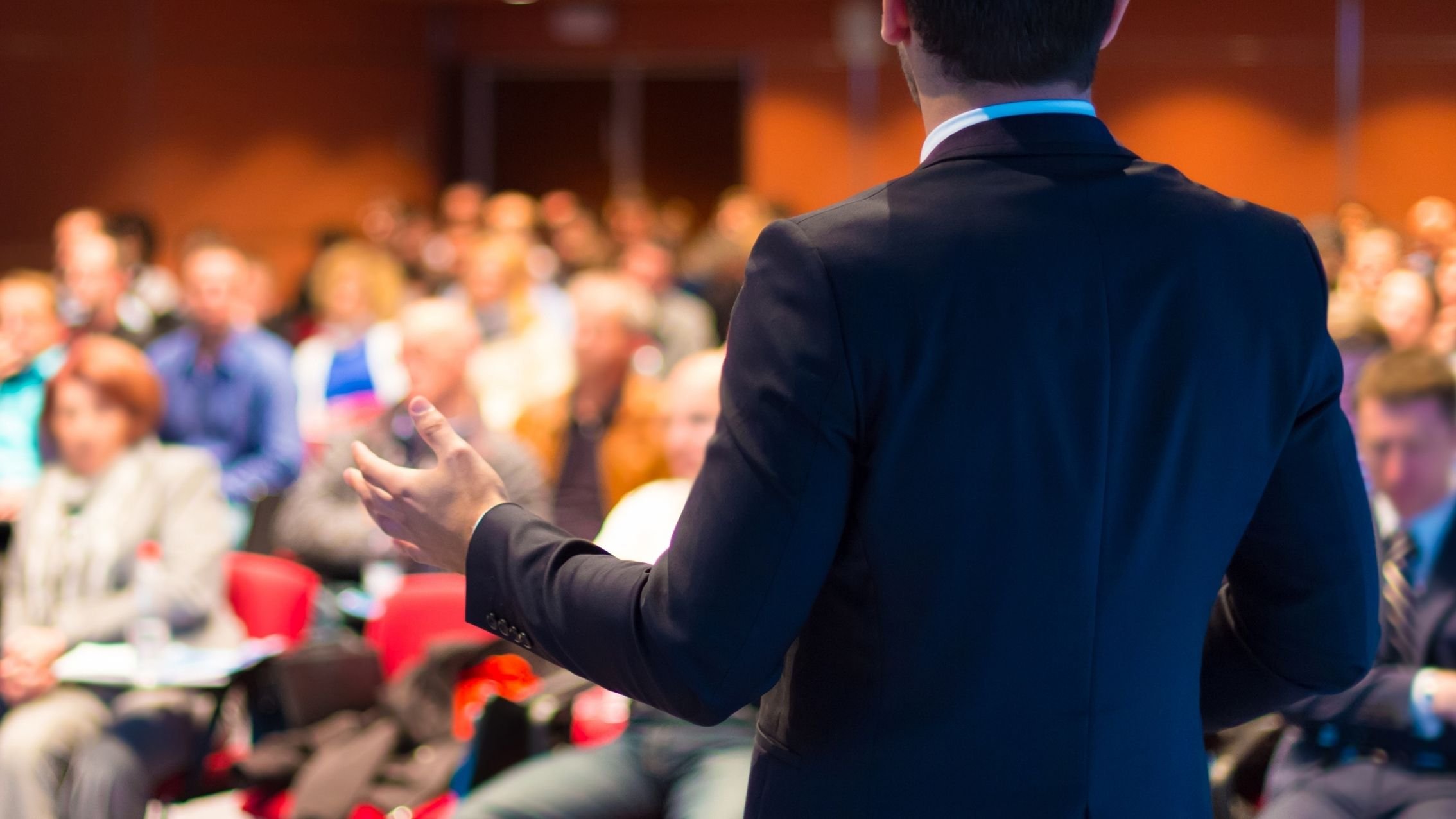 Speaker addressing a conference audience